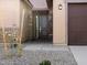 Modern front door with stone detailing and a small walkway at 2639 E Santa Ynez Dr, Casa Grande, AZ 85194