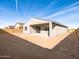 Large backyard with sandy ground and a new home at 2645 E Santa Ynez Dr, Casa Grande, AZ 85194