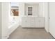 Bathroom with double vanity and bathtub at 2645 E Santa Ynez Dr, Casa Grande, AZ 85194