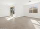 Bright dining room with tile floors and sliding glass door at 2645 E Santa Ynez Dr, Casa Grande, AZ 85194