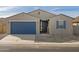 Single-story home with a two-car garage and landscaping at 2645 E Santa Ynez Dr, Casa Grande, AZ 85194