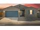 Single-story home with a two-car garage and landscaping at 2645 E Santa Ynez Dr, Casa Grande, AZ 85194