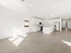 Modern white kitchen with island and stainless steel appliances at 2645 E Santa Ynez Dr, Casa Grande, AZ 85194