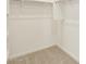 Large walk-in closet with shelving and hanging rod at 2665 E Santa Ynez Dr, Casa Grande, AZ 85194