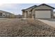 New construction home with gray exterior and two-car garage at 2665 E Santa Ynez Dr, Casa Grande, AZ 85194