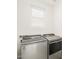 Laundry room with Whirlpool washer and dryer at 2665 E Santa Ynez Dr, Casa Grande, AZ 85194