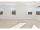 Living room with tile floor and multiple windows at 2665 E Santa Ynez Dr, Casa Grande, AZ 85194