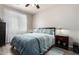 Bedroom with wood-look flooring and window coverings at 31627 N Poncho Ln, San Tan Valley, AZ 85143