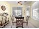 Bright breakfast nook with a round table and four chairs at 31627 N Poncho Ln, San Tan Valley, AZ 85143