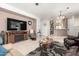 Open concept living room with a view into the kitchen at 31627 N Poncho Ln, San Tan Valley, AZ 85143