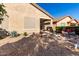 Backyard patio with seating area and desert landscaping at 31627 N Poncho Ln, San Tan Valley, AZ 85143