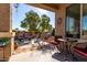 Covered patio with seating area and view of backyard at 31627 N Poncho Ln, San Tan Valley, AZ 85143