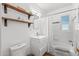 Clean bathroom with white tile, bathtub, and modern vanity at 3844 N 13Th Ave, Phoenix, AZ 85013