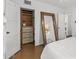 Bedroom with built-in shelving and dresser at 3844 N 13Th Ave, Phoenix, AZ 85013