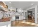 Bright kitchen with white cabinets and wood countertops at 3844 N 13Th Ave, Phoenix, AZ 85013