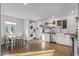 Modern kitchen with white cabinets, stainless steel appliances, and a farmhouse sink at 3844 N 13Th Ave, Phoenix, AZ 85013