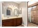 Bathroom boasts double sinks and a walk-in shower at 4343 E Downing St, Mesa, AZ 85205