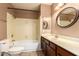 Clean bathroom with tub, toilet, and vanity at 4343 E Downing St, Mesa, AZ 85205