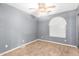 Simple bedroom with grey walls and carpet flooring at 4343 E Downing St, Mesa, AZ 85205