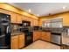 Kitchen boasts granite countertops and modern appliances at 4343 E Downing St, Mesa, AZ 85205