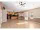 Bright living room featuring tile floors and a fireplace at 4343 E Downing St, Mesa, AZ 85205