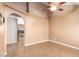 Bright living room with vaulted ceiling and tile floors at 4343 E Downing St, Mesa, AZ 85205