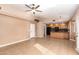 Open living area with tile floors and access to patio at 4343 E Downing St, Mesa, AZ 85205