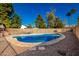 Inviting kidney-shaped pool with surrounding patio at 4343 E Downing St, Mesa, AZ 85205