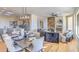 Elegant dining area with modern chandelier and hardwood floors at 7479 E Sunset Sky Cir, Scottsdale, AZ 85266