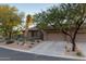 Two-car garage and desert landscaping at 7479 E Sunset Sky Cir, Scottsdale, AZ 85266