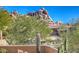 View of the property from the street, showcasing desert landscaping at 7479 E Sunset Sky Cir, Scottsdale, AZ 85266