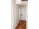 Clean and bright hallway with terracotta tile floors at 837 E Echo Ln, Phoenix, AZ 85020