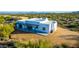 Aerial view of a contemporary desert home at 13924 E Windstone Trl, Scottsdale, AZ 85262