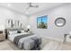 Main bedroom with wood-look floors, and stylish decor at 13924 E Windstone Trl, Scottsdale, AZ 85262