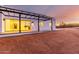 Modern home exterior with a covered patio and desert landscape at 13924 E Windstone Trl, Scottsdale, AZ 85262
