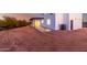 View of the home's back exterior at sunset at 13924 E Windstone Trl, Scottsdale, AZ 85262