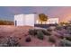 Modern desert home with clean lines and a covered patio at 13924 E Windstone Trl, Scottsdale, AZ 85262