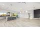 Open floor plan showing modern kitchen with island and stainless steel appliances at 13924 E Windstone Trl, Scottsdale, AZ 85262