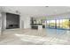 Modern kitchen with large island, stainless steel appliances, and open floor plan at 13924 E Windstone Trl, Scottsdale, AZ 85262
