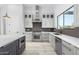 Modern kitchen with stainless steel appliances and custom cabinetry at 13924 E Windstone Trl, Scottsdale, AZ 85262