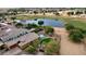 Stunning property with pool, golf course & lake views at 1950 N 142Nd Ave, Goodyear, AZ 85395