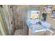 Updated bathroom with walk-in shower and soaking tub at 1950 N 142Nd Ave, Goodyear, AZ 85395
