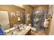 Bathroom with double sinks and walk-in shower at 1950 N 142Nd Ave, Goodyear, AZ 85395