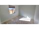 Simple bedroom with neutral walls and carpet at 1950 N 142Nd Ave, Goodyear, AZ 85395