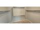 Large walk-in closet with shelving and rods at 1950 N 142Nd Ave, Goodyear, AZ 85395