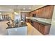 Kitchen boasts granite countertops and stainless steel appliances at 1950 N 142Nd Ave, Goodyear, AZ 85395