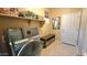 Laundry room with washer, dryer, and shelving at 1950 N 142Nd Ave, Goodyear, AZ 85395