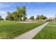 Sand volleyball court with surrounding green space at 3036 E Pinto Dr, Gilbert, AZ 85296