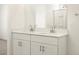 Close up of double sink vanity with modern fixtures in bright bathroom at 3390 E Audrey Dr, San Tan Valley, AZ 85143