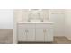 Bathroom with double sinks and a large mirror with a view of the shower at 3390 E Audrey Dr, San Tan Valley, AZ 85143